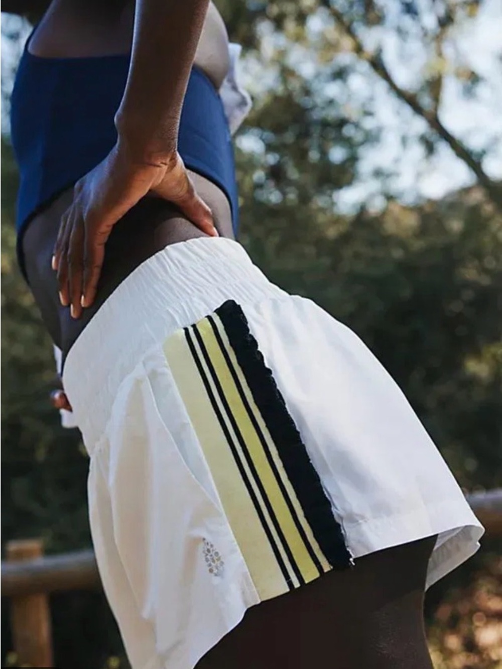 FP Movement by Free People White Athletic Shorts with Yellow and Black Stripe